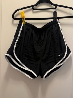 Nike Black Athletic Shorts with White Trim and Swoosh